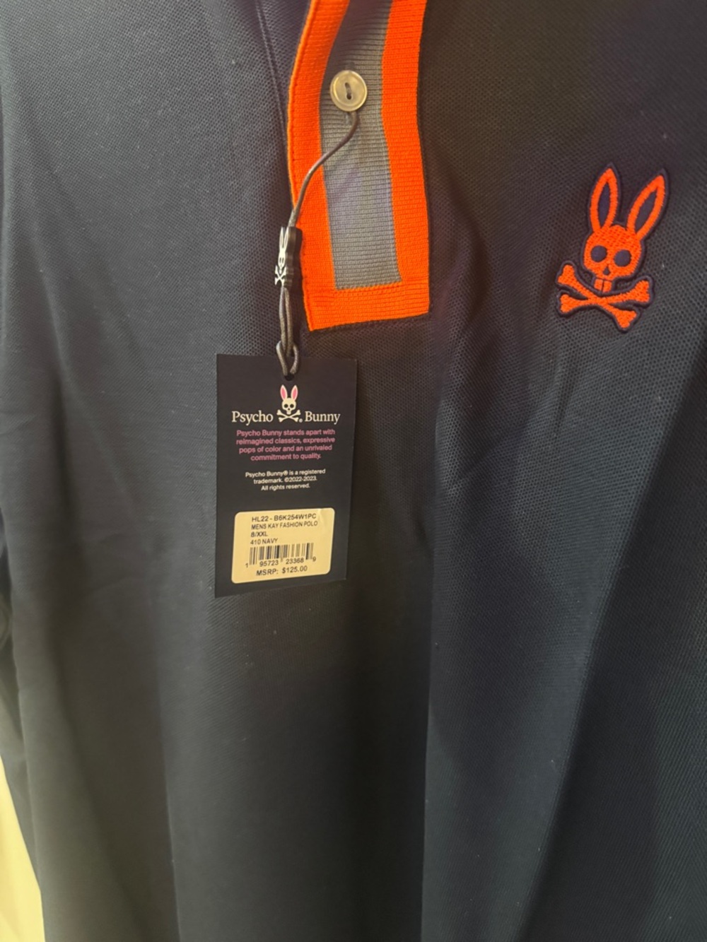 Psycho Bunny Navy Polo with Orange Trim and Logo